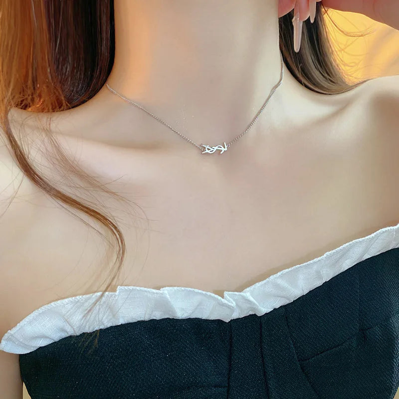 Niche fashion light luxury temperament earrings silver needle metal style letter earrings French simple high-end feeling earring