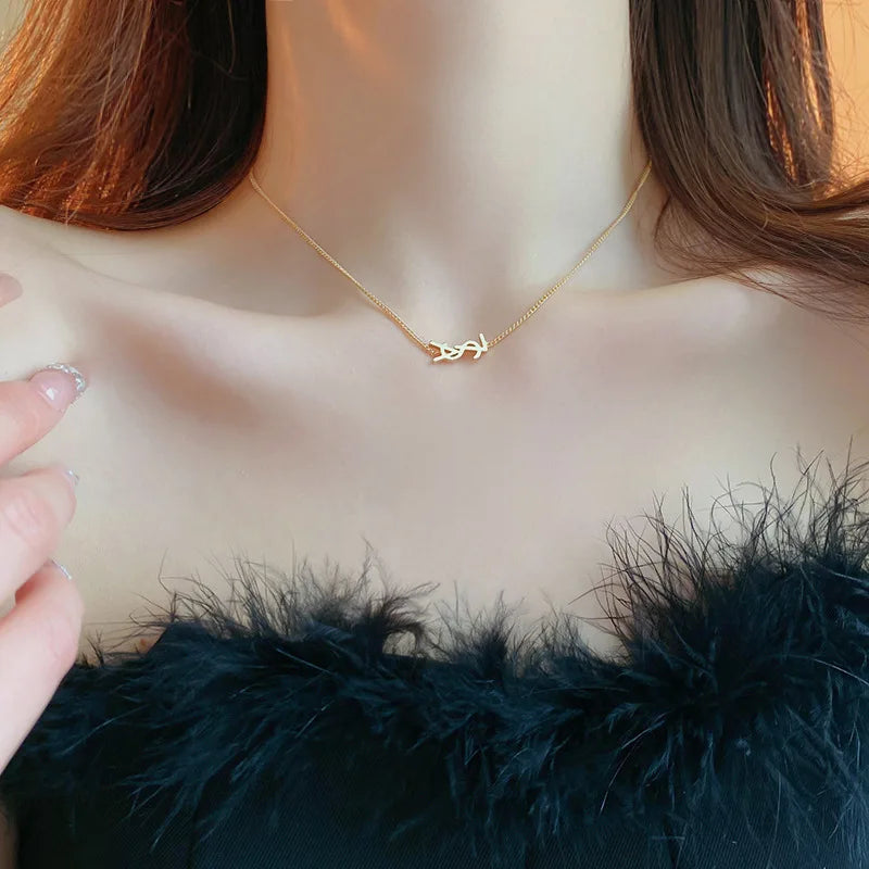 Niche fashion light luxury temperament earrings silver needle metal style letter earrings French simple high-end feeling earring