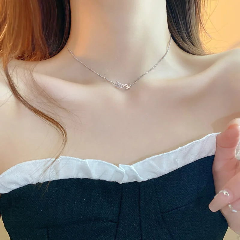 Niche fashion light luxury temperament earrings silver needle metal style letter earrings French simple high-end feeling earring