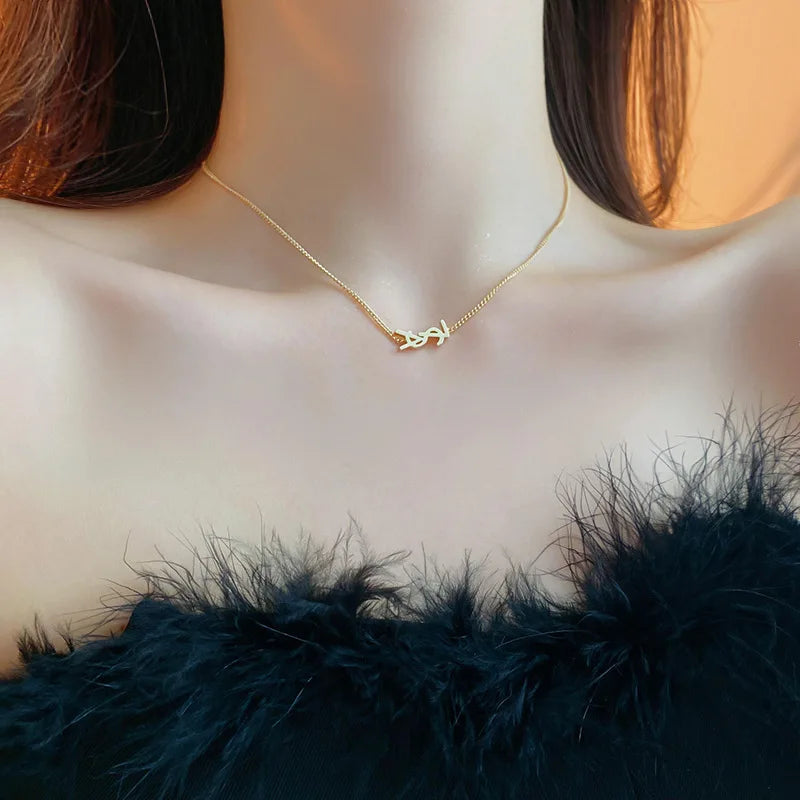 Niche fashion light luxury temperament earrings silver needle metal style letter earrings French simple high-end feeling earring