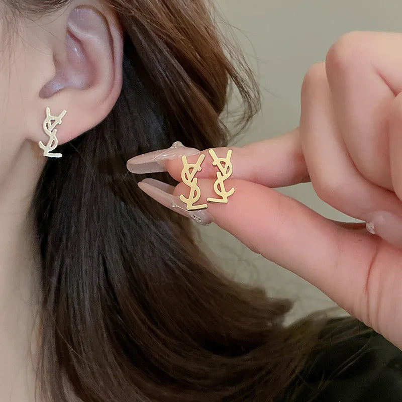 Niche fashion light luxury temperament earrings silver needle metal style letter earrings French simple high-end feeling earring